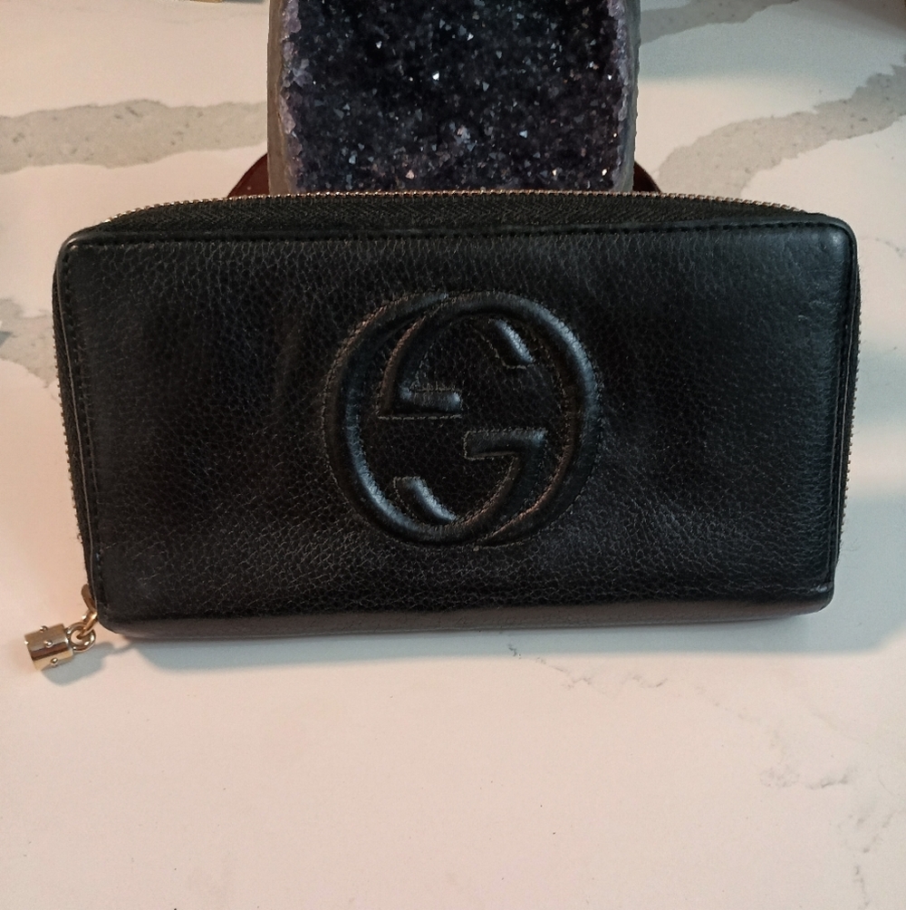 Gucci Black Leather Zip Around Wallet with Embossed Logo